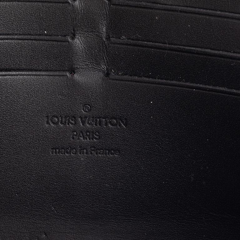 Louis Vuitton, A Suhali leather 'Le Favori Verone Wallet'.
