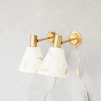 Tomas Jelinek,  a pair of brass Stockholm wall lamps for IKEA 1990s.