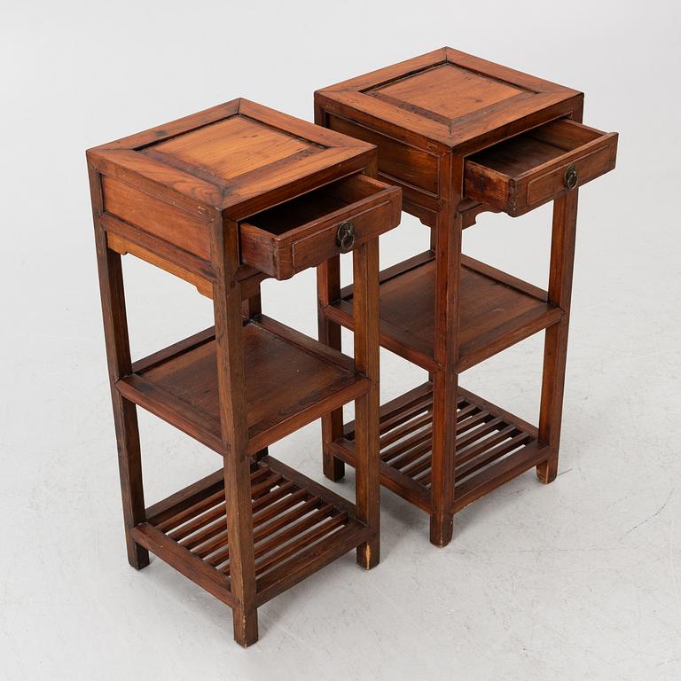A pair of Chinese lamp tables / pedestals, hardwood, 20th century.