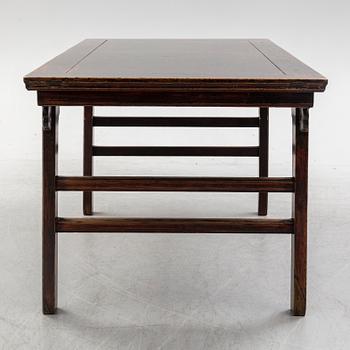 A Chinese wooden table, 20th century.