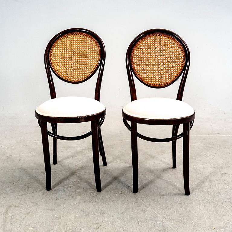 A set of four stained wood chairs, first half of the 20th century.
