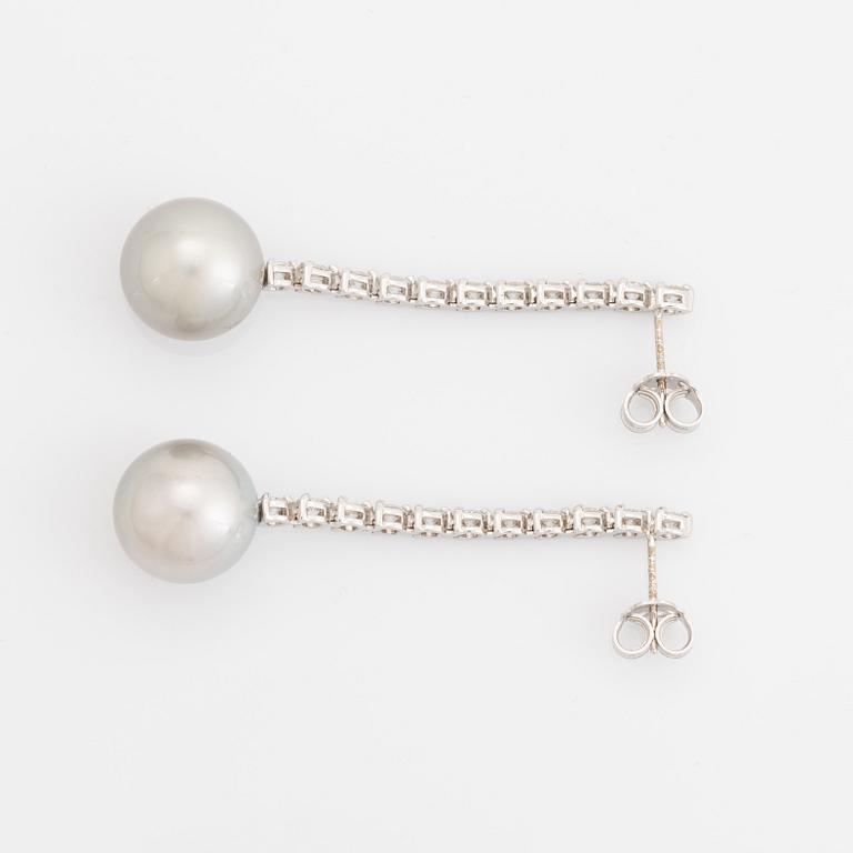 Tahit pearl and brilliant-cut diamond earrings.