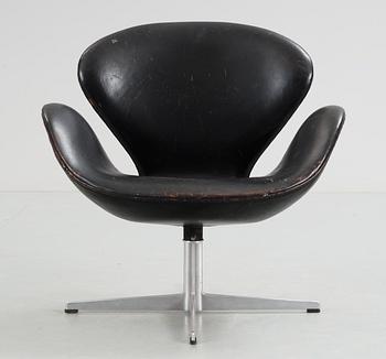 528. An Arne Jacobsen black leather 'Swan' easy chair, Fritz Hansen, Denmark 1960's.