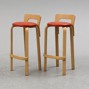 ALVAR AALTO, a pair of birch bar stools from Artek, Finland,