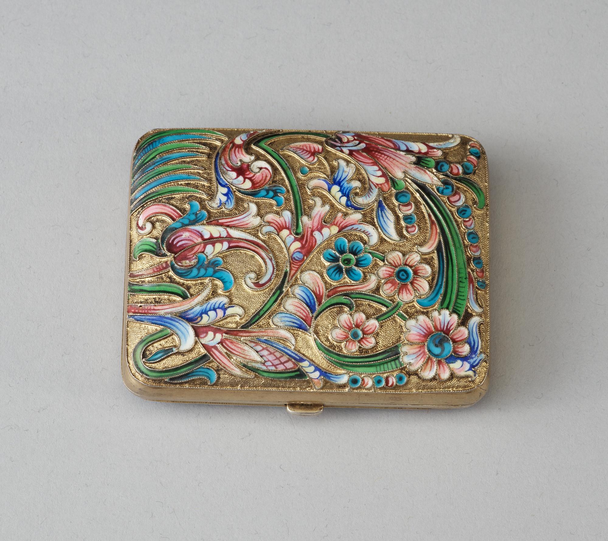 A Russian silver-gilt and enamel cigarette-case, makers mark of Nikolaj Swerew, Moscow 1896-1908.