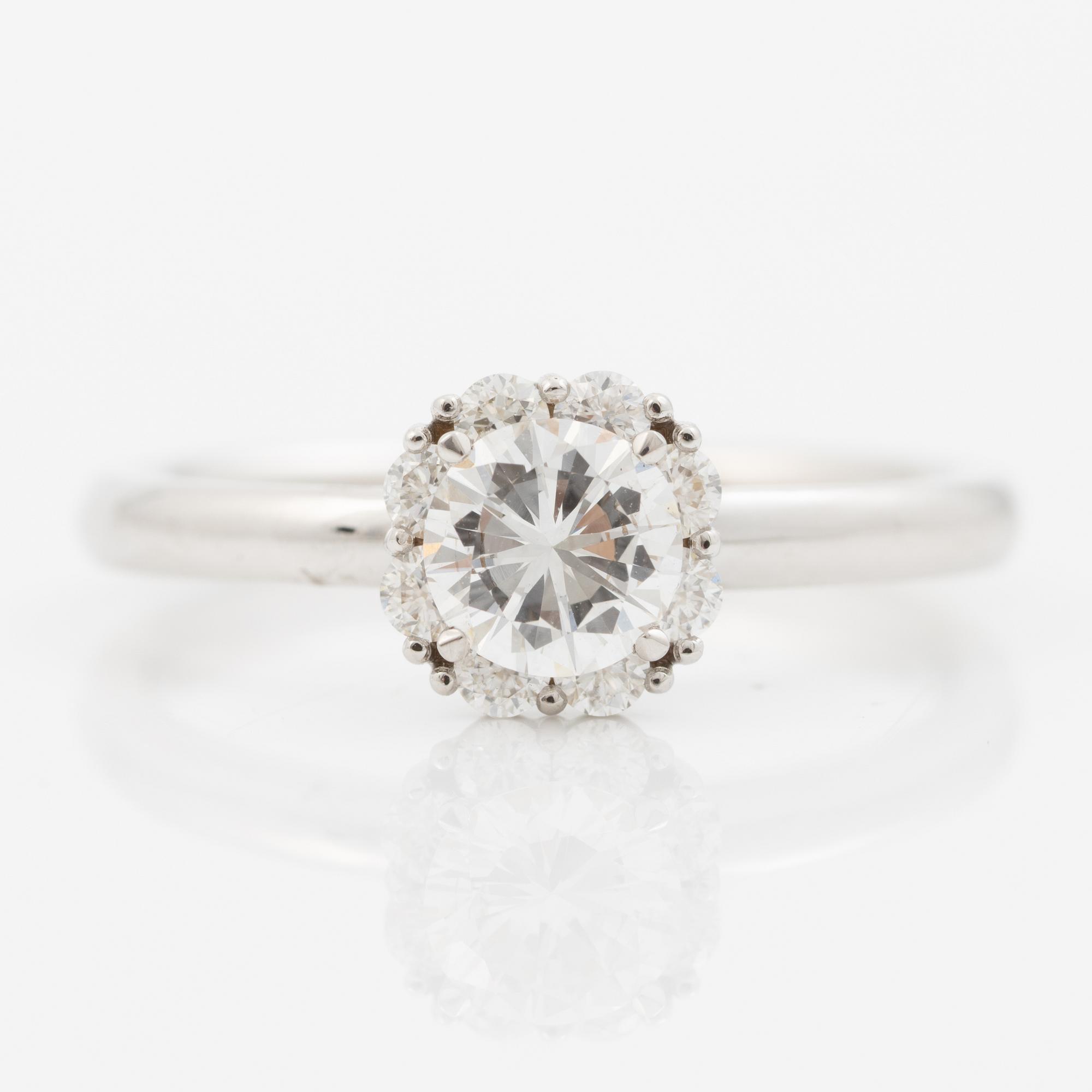 Ring 18K white gold set with a brilliant-cut diamond, accompanied by an IGI report.