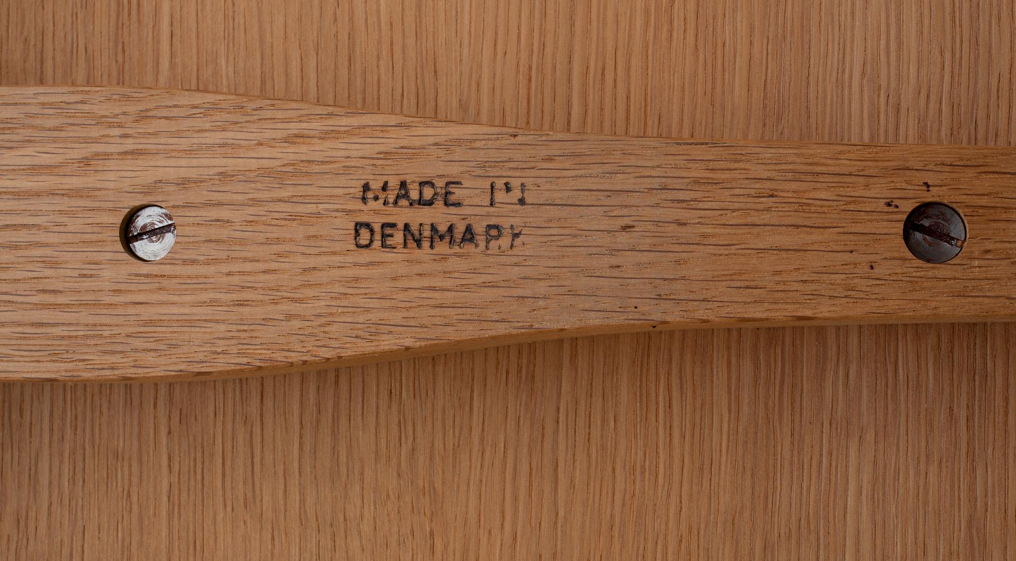 A Hans J Wegner oak dinner table by Andreas Tuck, Denmark, 1950's-60's.