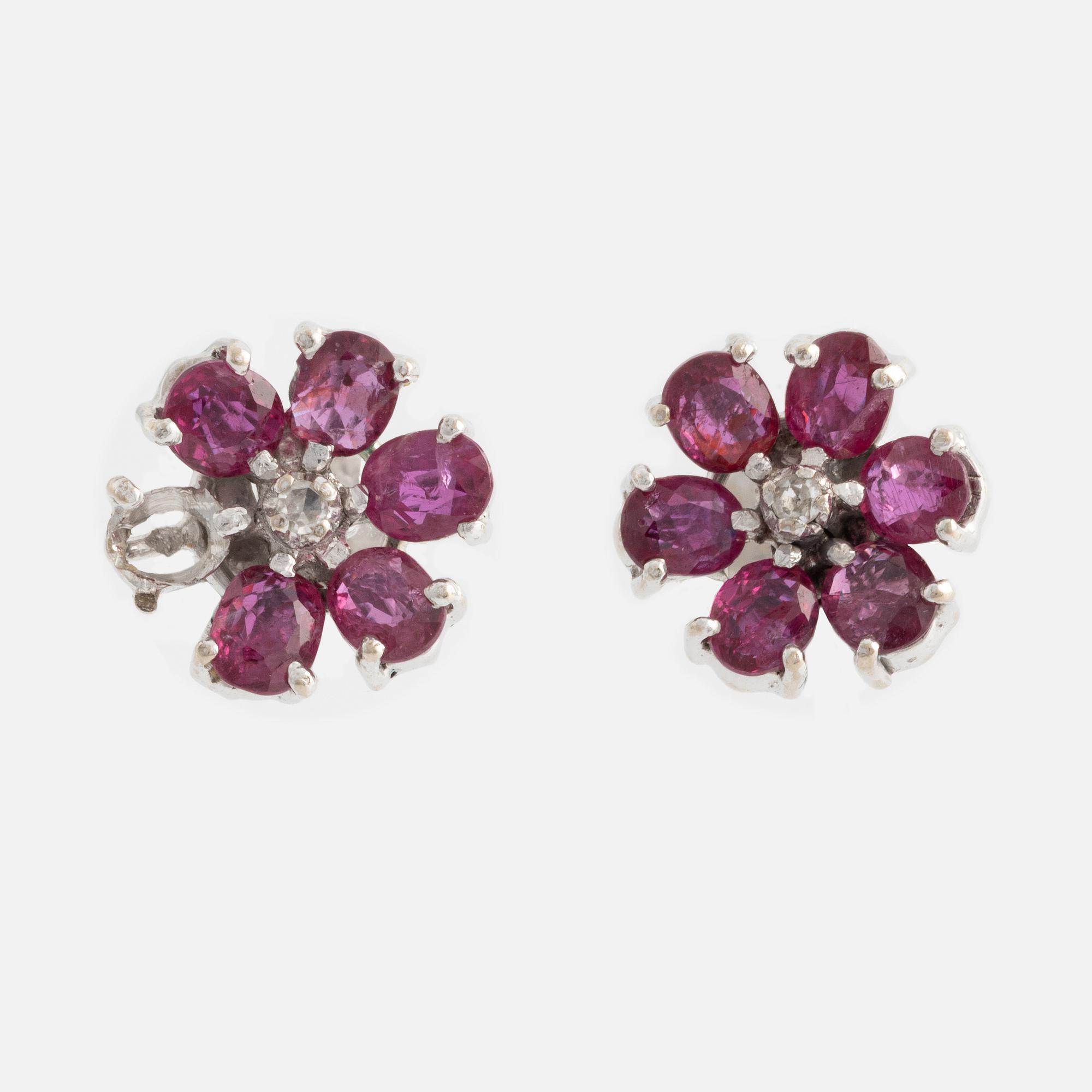 Earrings, one pair, white gold with rubies and small diamonds.