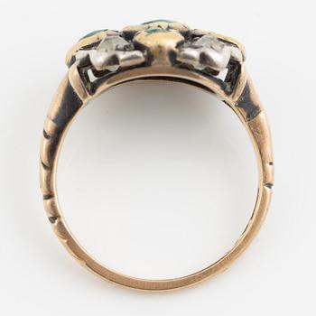 Ring 18K gold and silver set with old-cut diamonds and green stones.