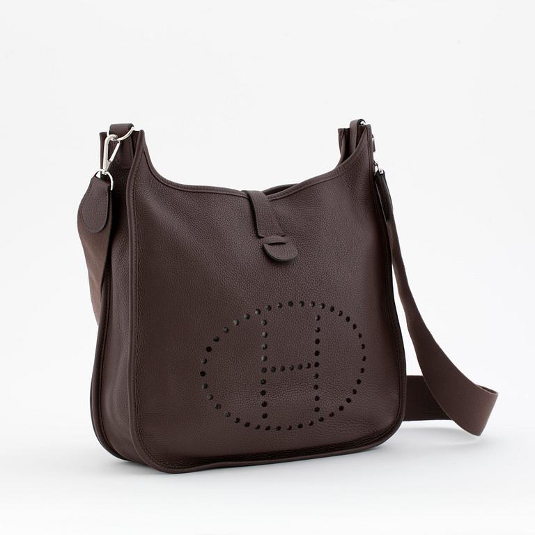 HERMÈS, a taurillon clemence chocolat shoulder bag, "Evelyn III / GM".