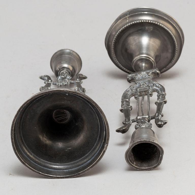 Two pair of Swedish pewter candlesticks, early 19th century and ca 1900.