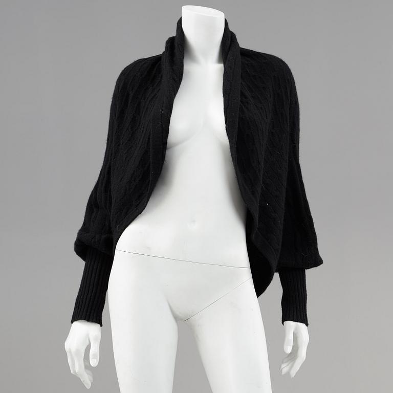 Two cardigans and a silkblouse by Ralph Lauren.