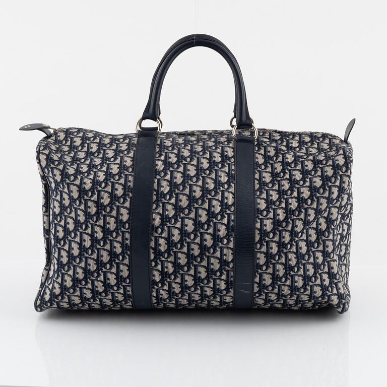 Christian Dior, a canvas weekend bag.