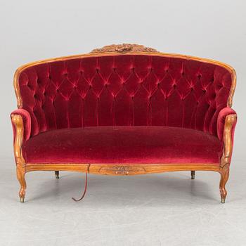 A sofa, circa 1900.