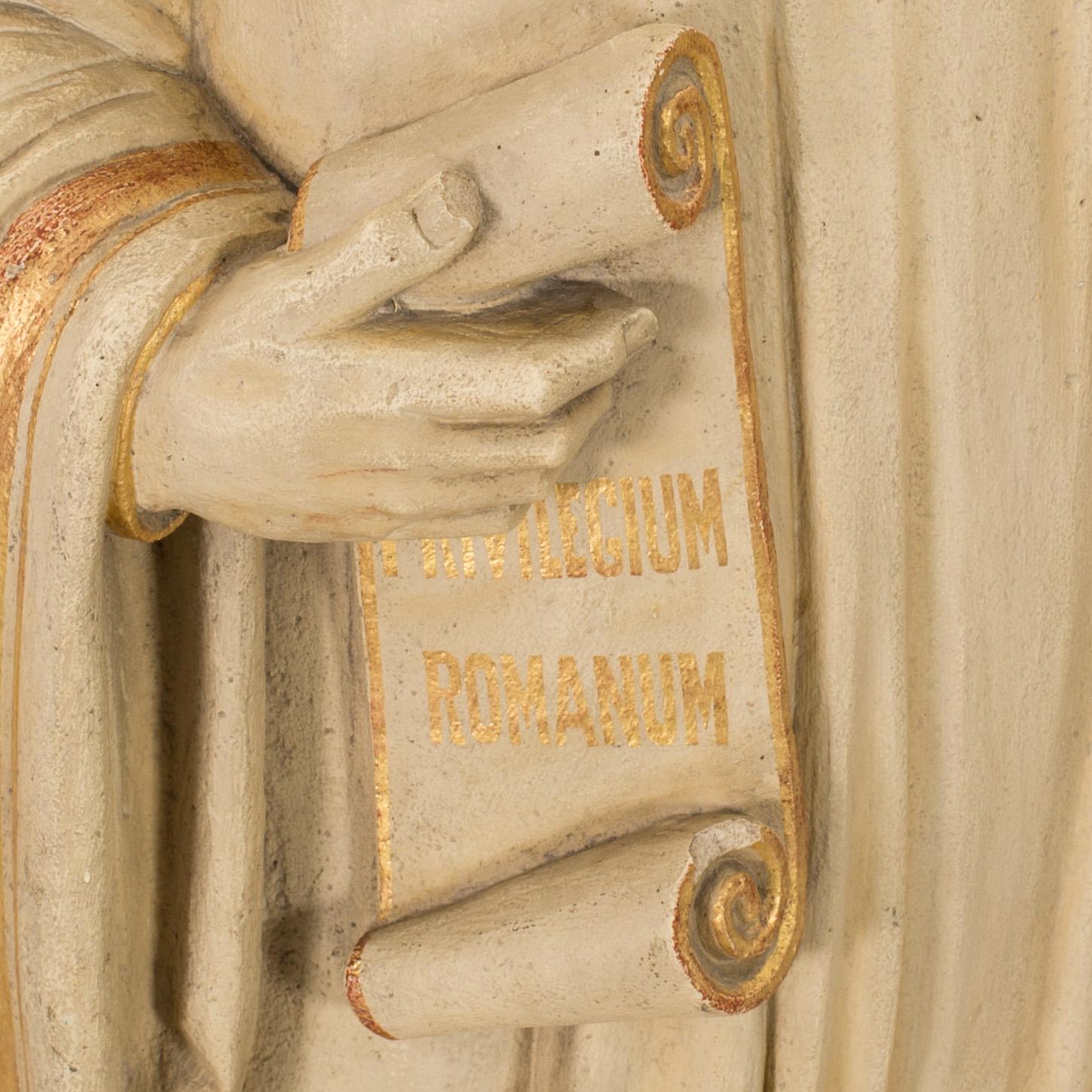 A Dutch concrete sculpture marked J van den Broeck Antwerpen 1907.