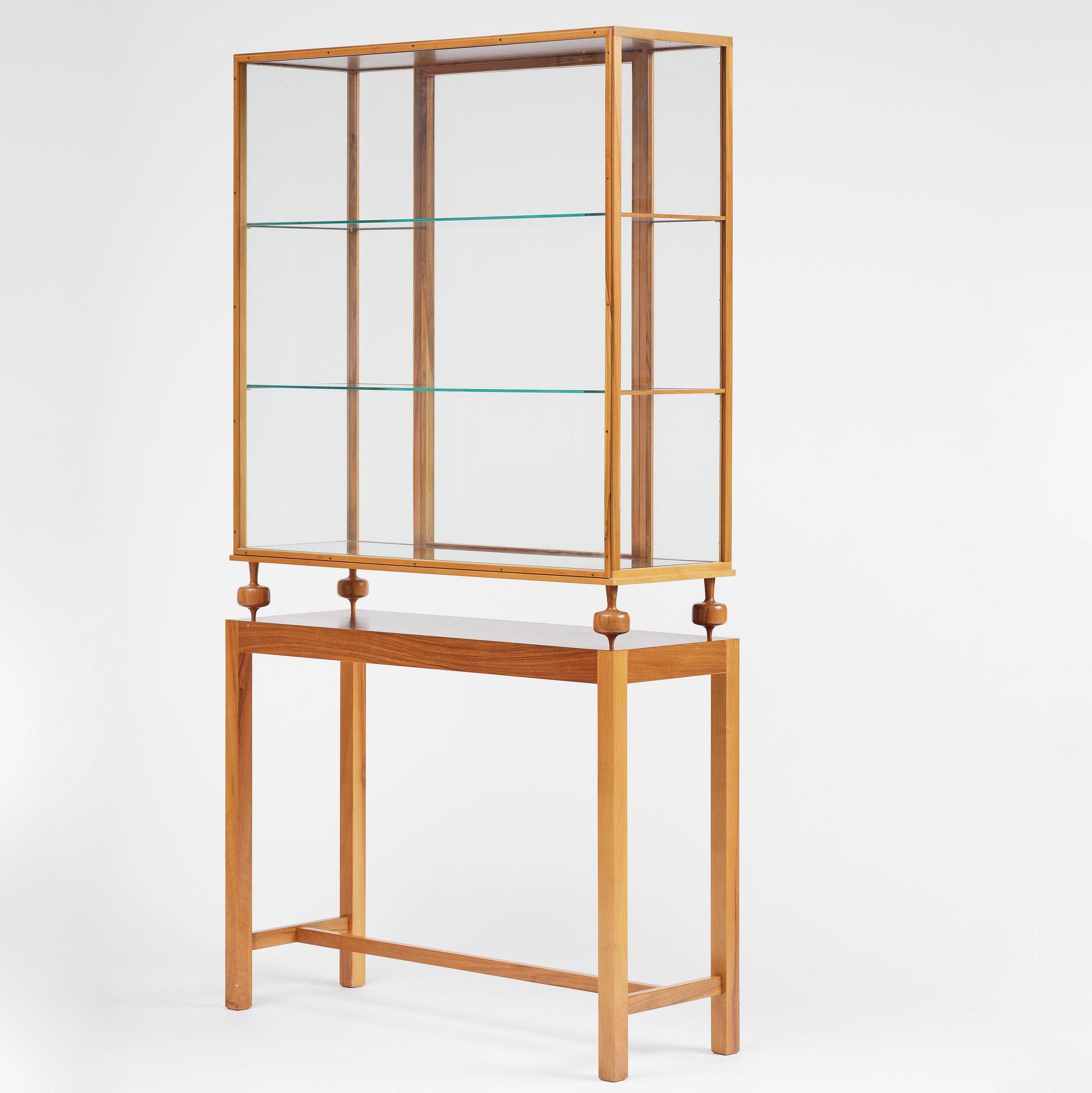 Josef Frank, a walnut showcase cabinet model "B 2077", Firma Svenskt Tenn.