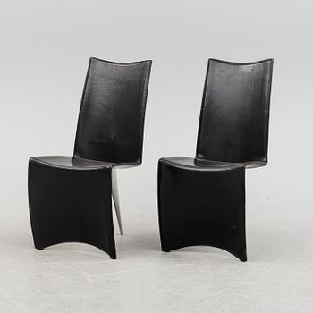 A Philippe Starck 'J Serie Lang' black leather and cast aluminium lounge chair, by Aleph, Italy.