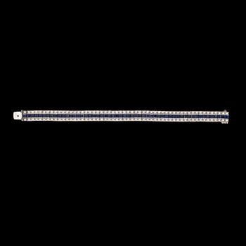 A brilliant cut diamond, tot. app. 3.20 cts, and blue sapphire bracelet.