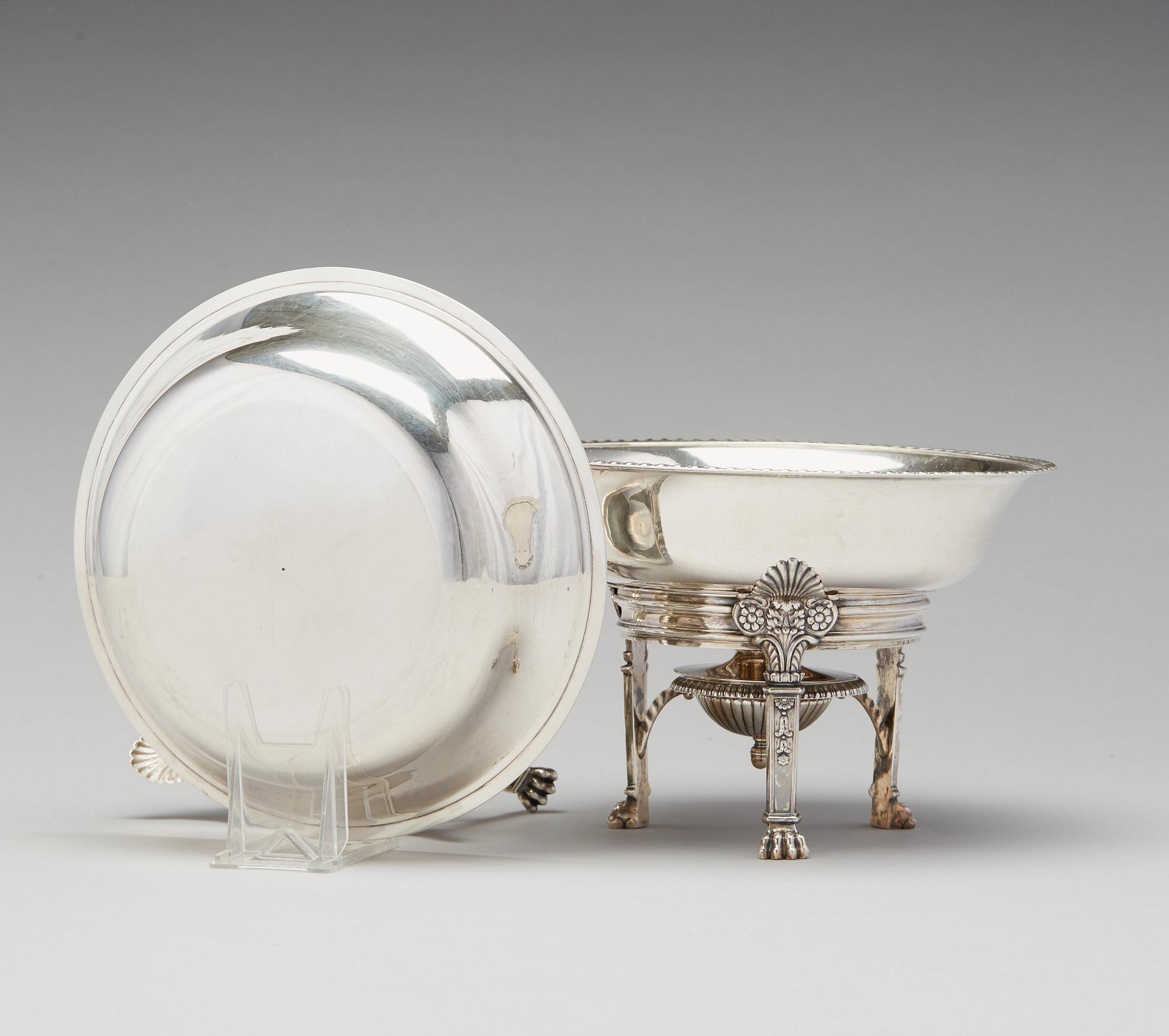 A pair of Swedish Empire silver tureens on stand, mark of Adolf Zethelius, Stockholm 1830.