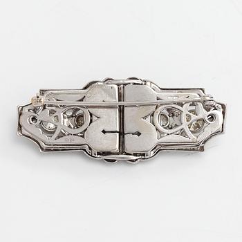 A 14K white gold Art Deco double clip brooch with old-cut diamonds approximately 4.90 cts in total. Austrian importmark.