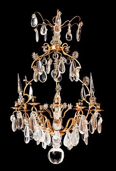 1275. A Baroque-style 20th century nine-light chandelier.