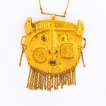 TAPIO WIRKKALA, PENDANT, "Devil's head", 14K gold, N. Westerback, Helsinki 1968.