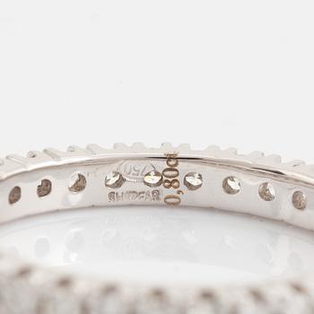 Brilliant cut diamond eternity ring.