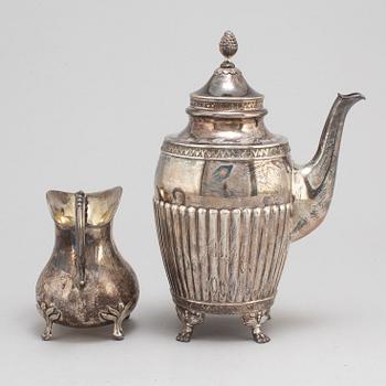 A silver coffee pot and creamer, Stockholm, 1875-1917.