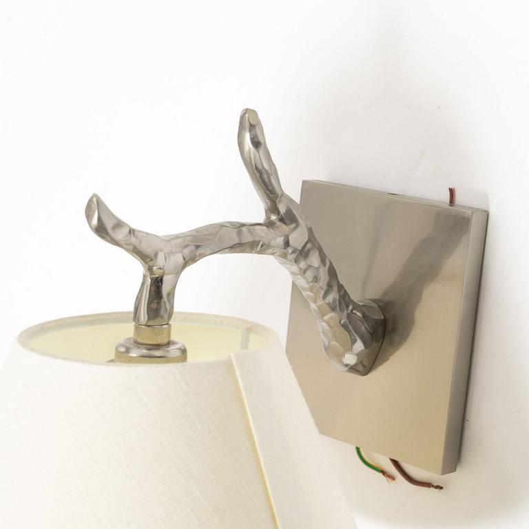 A pair of 'Twig Down' wall lamps, Vaughan, United Kingdom.