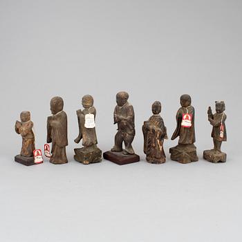 A group of seven wooden figurines, Ming dynasty and later.