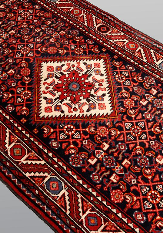 A pictoral Hamadan runner, ca 310 x 115 cm.