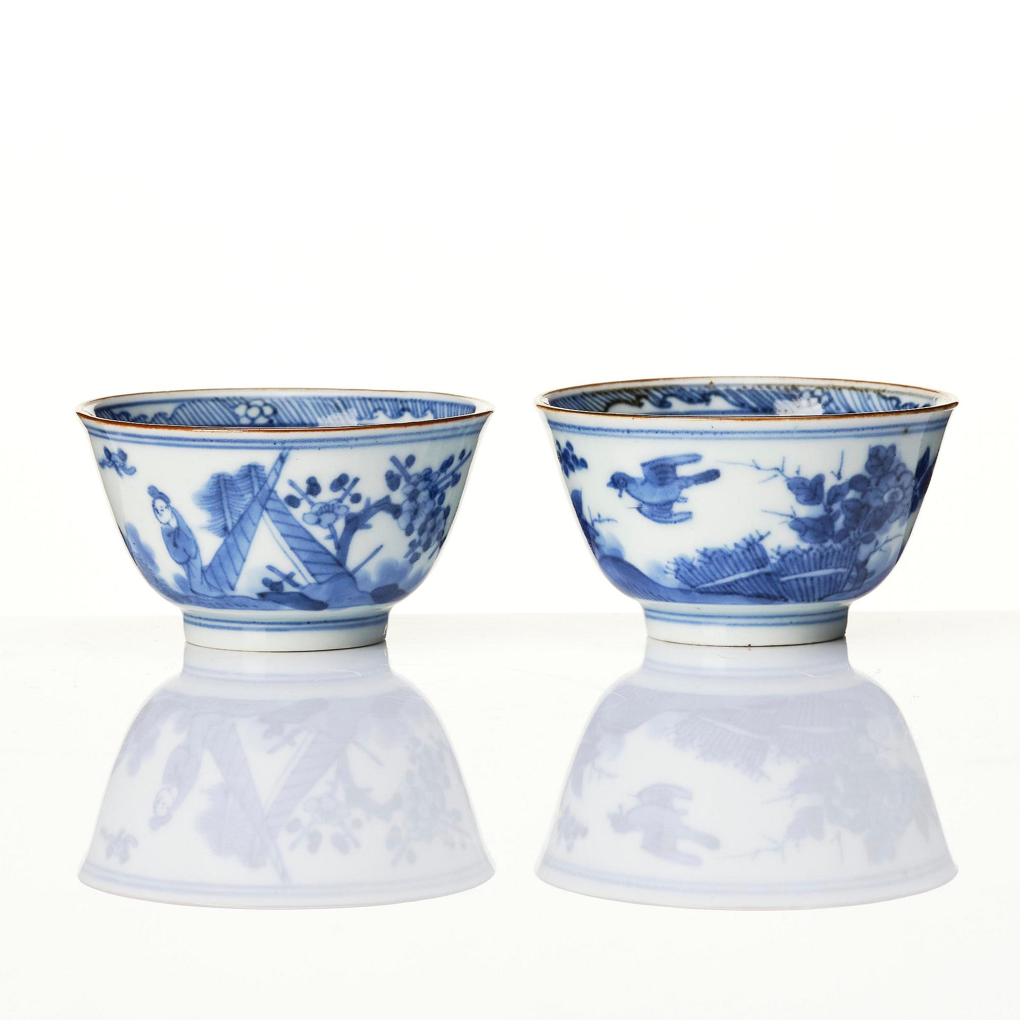A matched set of eight blue and white cups and stands, Qing dynasty, Kangxi (1662-1722).