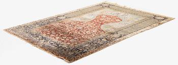 An antique silk rug, probably Istanbul, Turkey, c. 181 x 127 cm.