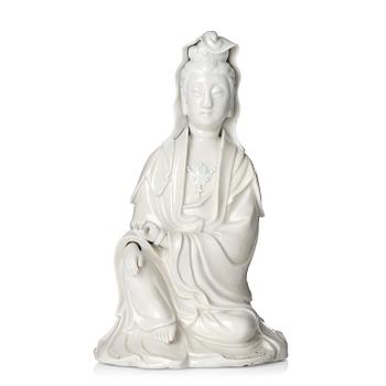 1183. A blanc de chine figure of Guanyin, Qing dynasty, 18th century.
