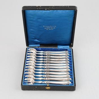 A set of twelve French 19th centurey silver oyster forks.