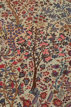 A CARPET, a semi-antique Tabriz probably, ca 393 x 284 cm.