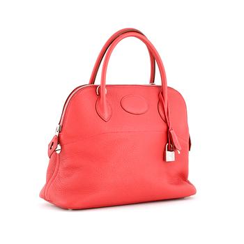 HERMÈS, a pink coral leather bag.