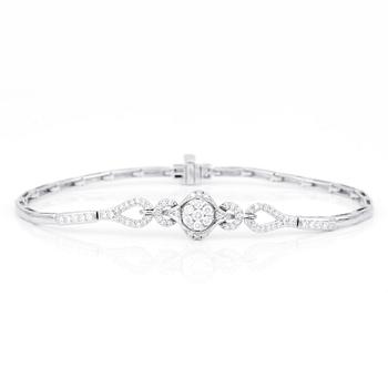 ARMBAND, 14K vitguld med runda och briljantslipade diamanter, tot ca 0,72 ct. Vikt ca 7,27 g.