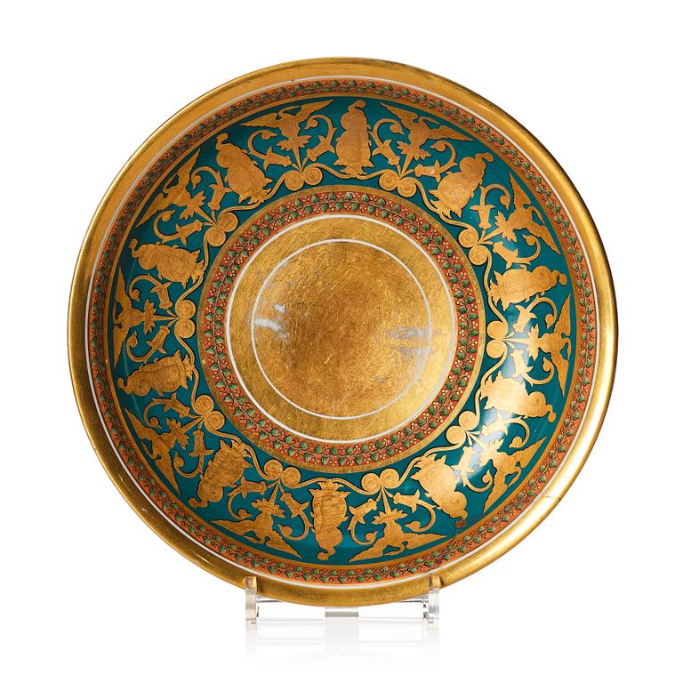 A gilded and painted Empire dish, 19th Century.