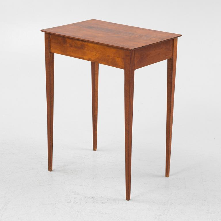 A Swedish Empire mahogany table, early 19th century.