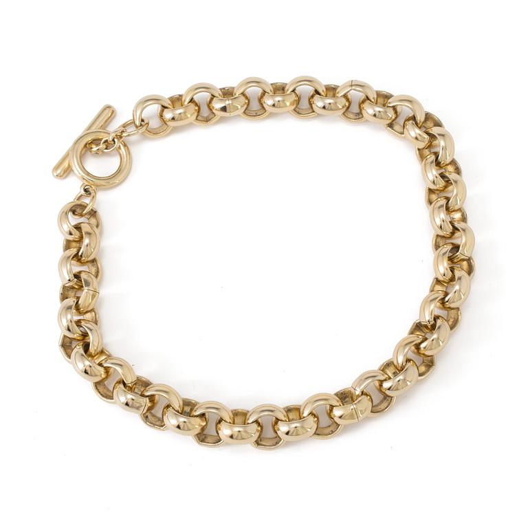 A necklace by Christian Dior.