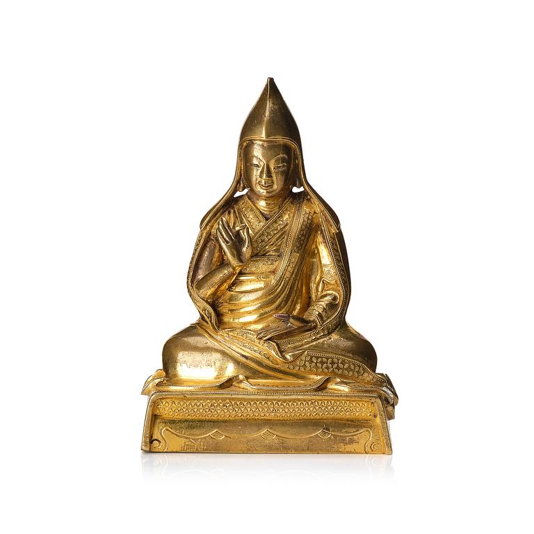 A gilt bronze sculpture of a Lama, Tibet, 18th century.