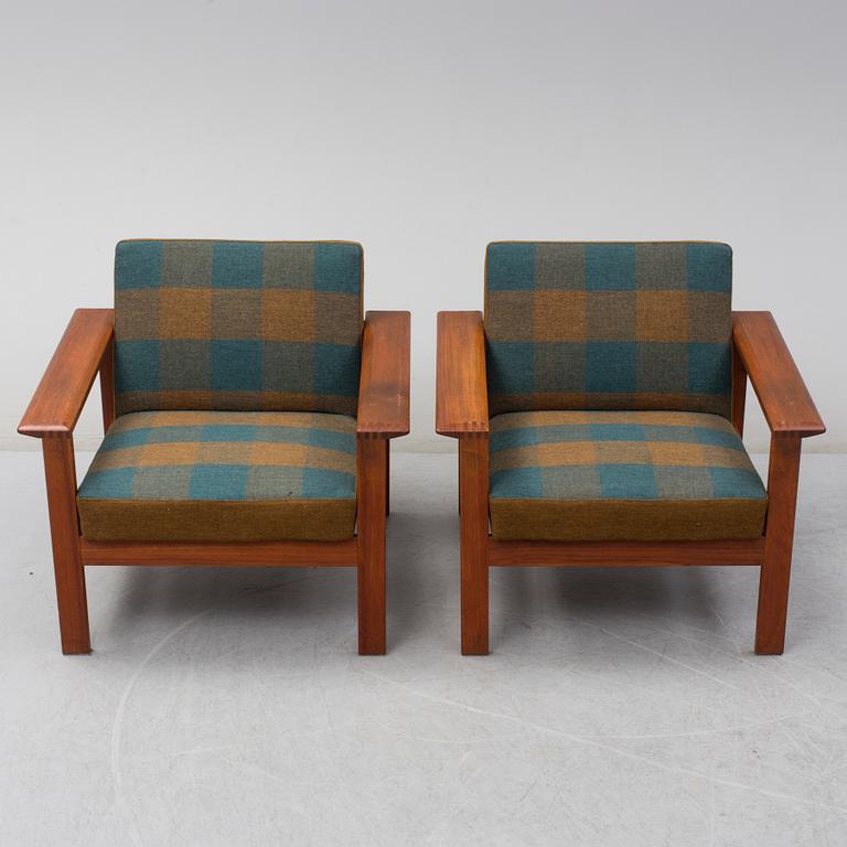 A pair of 'Kubus' easy chairs by Gerhard Berg for Stokke, Norway.