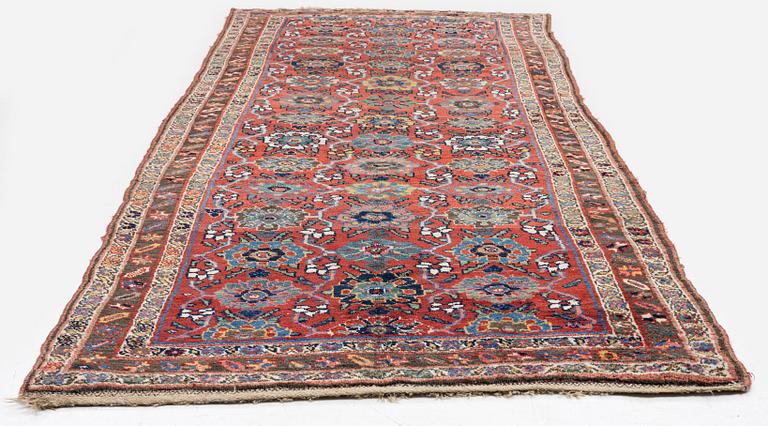 An antique Bidjar carpet, West Persia, c. 352 x 148 cm.