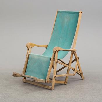 a mid 20th century deck chair.