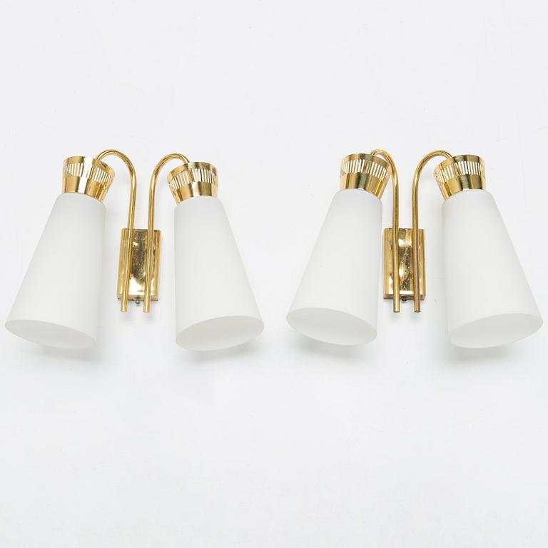 A pair of mid-20th century 'EY 60' wall lights for Itsu.