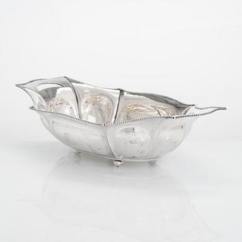 An early 20th-century silver bread basket, maker's mark of Hjalmar Fagerros, Helsinki 1911.