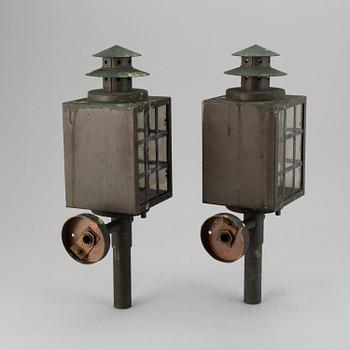 A 20th Century pair of copper wall lanterns.