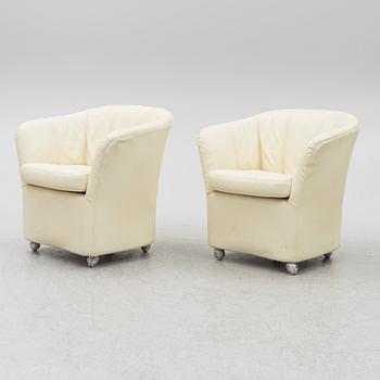 A pair of leather armchairs, Dux, Sweden, 1980's.