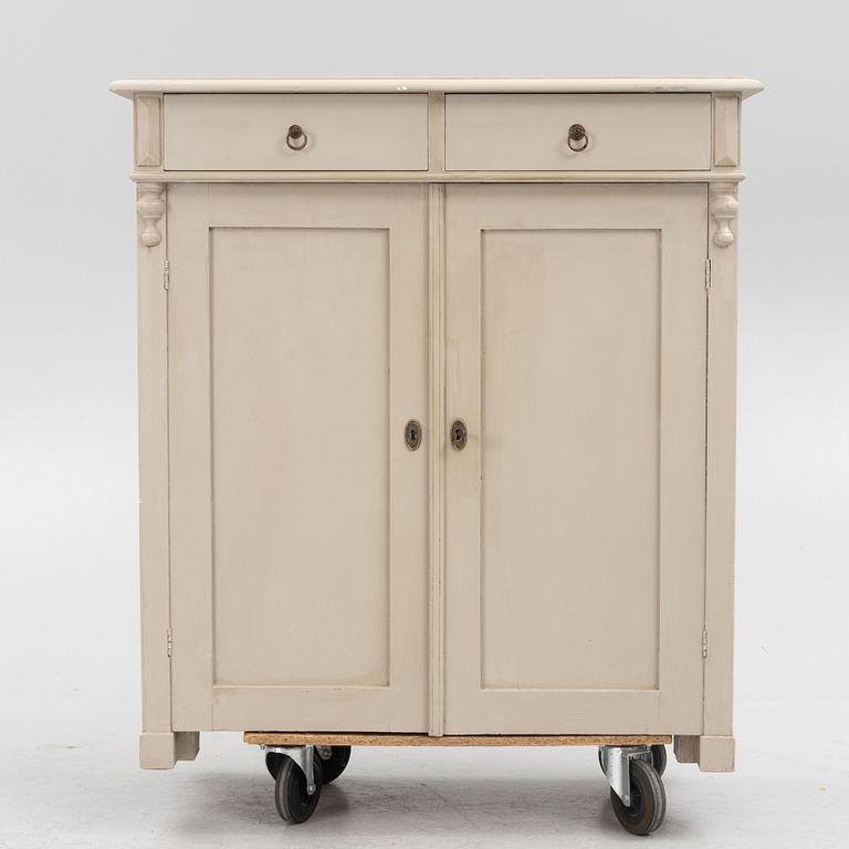 A cupboard, early 20th Century.